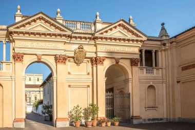 NOVARA,ITALY - JUNE 30,2022 - View at the Gate to Diocese courtyard in Novara. Novara is the capital city of the province of Novara in the Piedmont region in Italy.