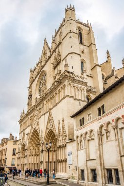 LYON, FRANCE - JUNE 26,2022 - View at the Cathedral of Saint John the Baptist in the streets of Lyon. Lyon is the third-largest city and second-largest metropolitan area of France.