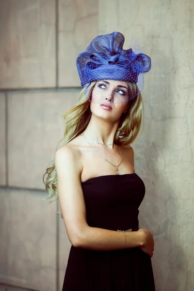 Retro girl in a blue hat — Zdjęcie stockowe