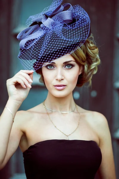 Retro girl in a blue hat — Stock Photo, Image