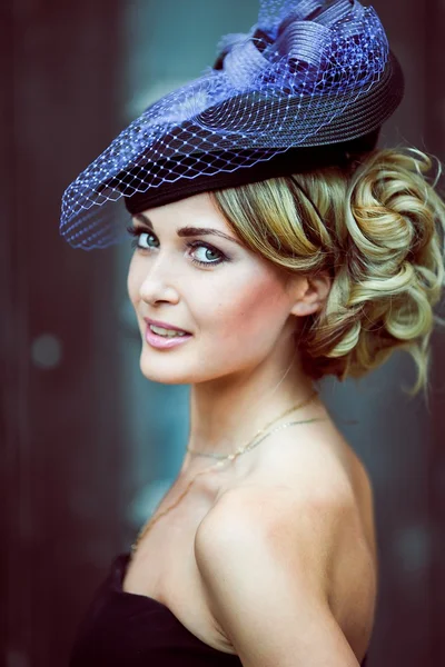 Retro girl in a blue hat — Stock Photo, Image
