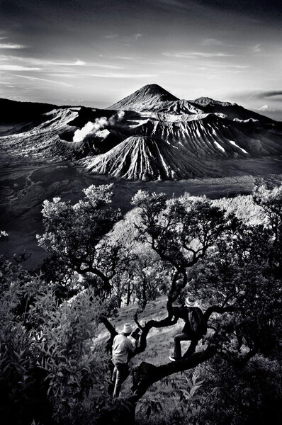 View of Bromo mountain area under cloudy sky