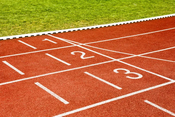 White lines and numbers on the track at stadium . — Stock Photo, Image