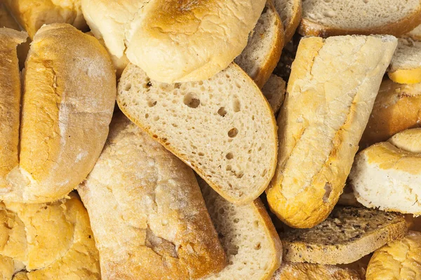 Plátky chleba a pečivo — Stock fotografie
