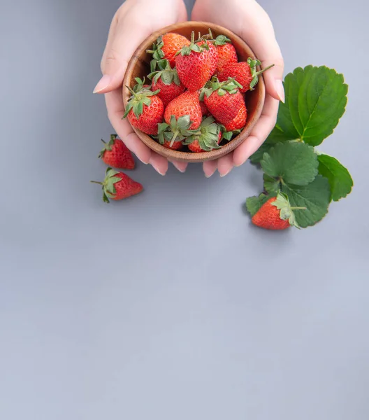 Young Woman Holding Bowl Strawberries Isolated Airy Blue Background Closeup — Stock Photo, Image