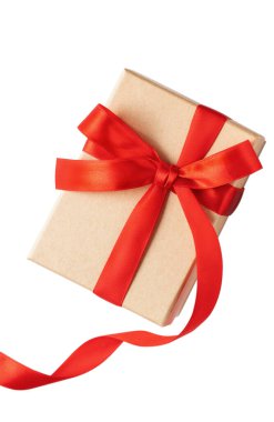 Beautiful gift box wrapped with ribbon bow isolated on white background.