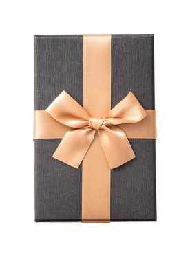 Beautiful gift box wrapped with ribbon bow isolated on white background.