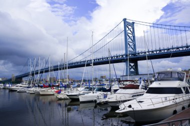 Benjamin franklin bridge and yachts clipart