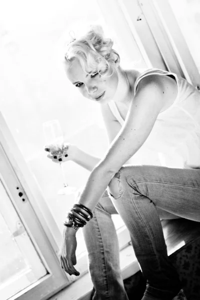 Black and white blond hair fashion model with champagne — Stock Photo, Image