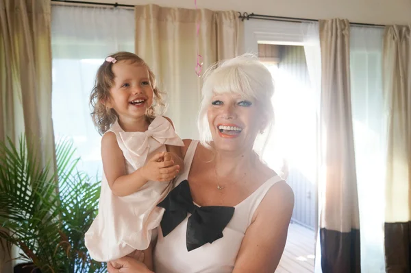 Happy grandmother with granddaughter — Stock Photo, Image