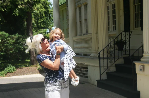 Happy grandmother with granddaughter — Stock Photo, Image