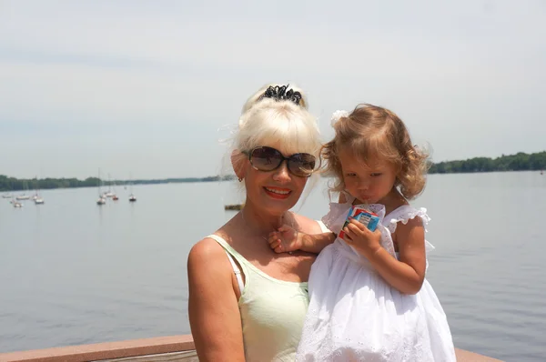 Happy grandmother with granddaughter — Stock Photo, Image