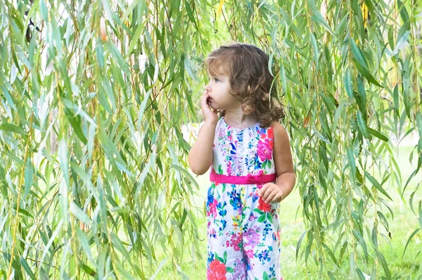 Cute baby girl in the forest in autumn — Stock Photo, Image