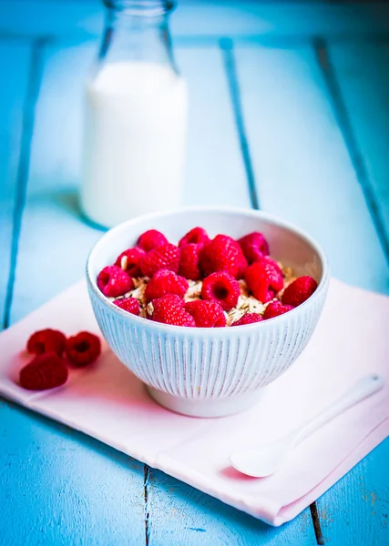 Granola with berries and almonds in a bowl — Stock Photo, Image