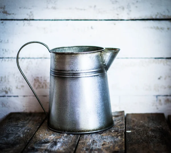 Rustic vase on wooden background — Stock Photo, Image