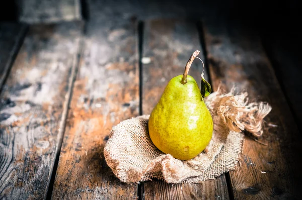 Pears on rustic wooden background — Stock Photo, Image