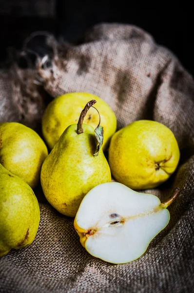 Pears on rustic wooden background — Stock Photo, Image