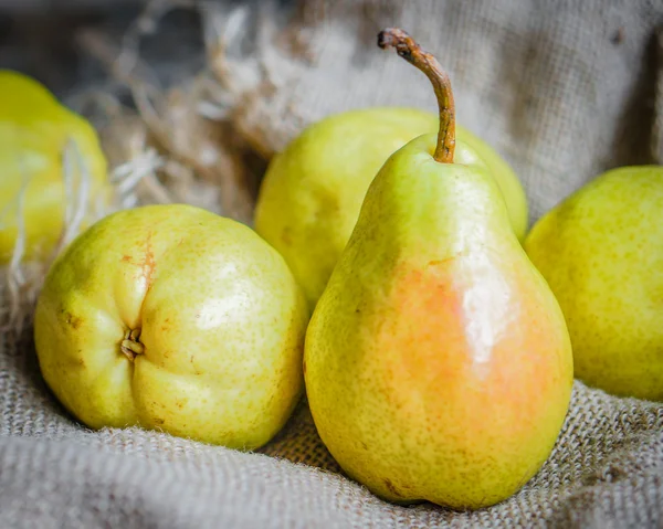 Pears on rustic wooden background — Stock Photo, Image