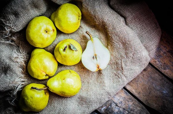 Pears on rustic wooden background — Stock Photo, Image