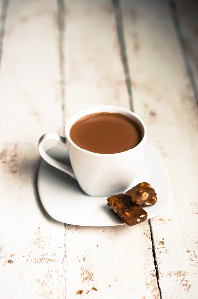 Kopp varm choklad på trä bakgrund — Stockfoto