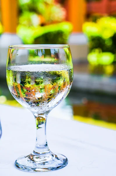 Glass of water outdoors — Stock Photo, Image