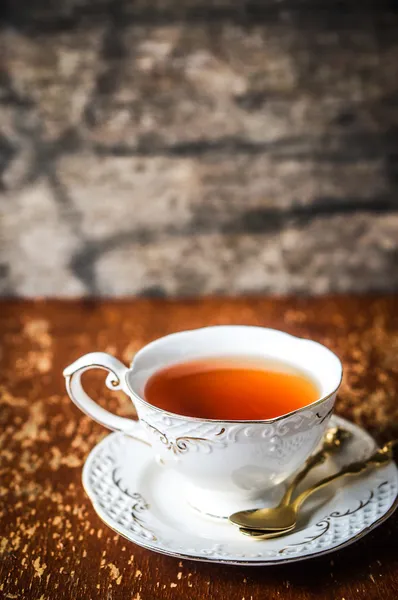 Tasse de thé sur fond en bois — Photo