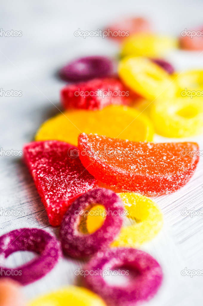 Assorted candies on white background