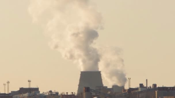 Factory smoke emissions over the city, winter — Stock Video