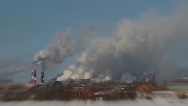 Winter fishing on the background of factory chimneys, cranes — Stock Video
