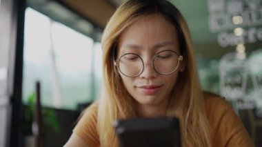 young casual woman looking at camera