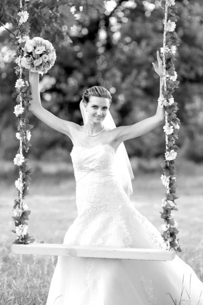 Bride on swing — Stock Photo, Image