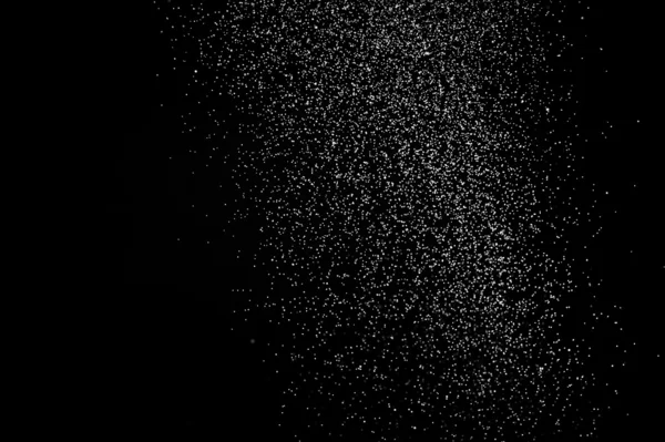 黒い背景に抽象的な水スプレー — ストック写真