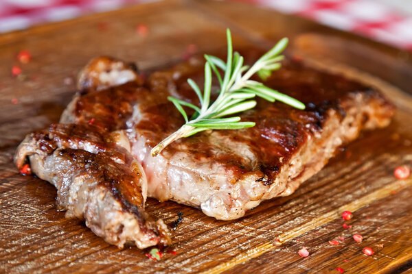 Grilled pork ribs with spices and rosemary