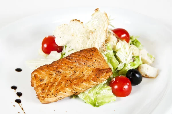 Caesar salad with salmon — Stock Photo, Image