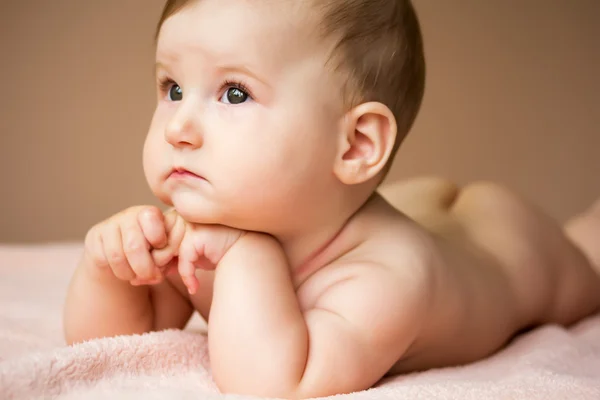 Charming dreamy baby girl — Stock Photo, Image