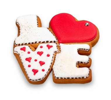 Gingerbread in the shape of LOVE. Isolated on white background