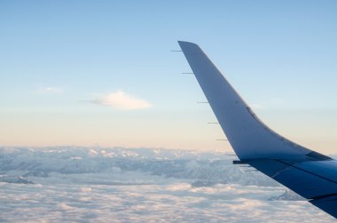 view from the airplane, clouds, wing clipart