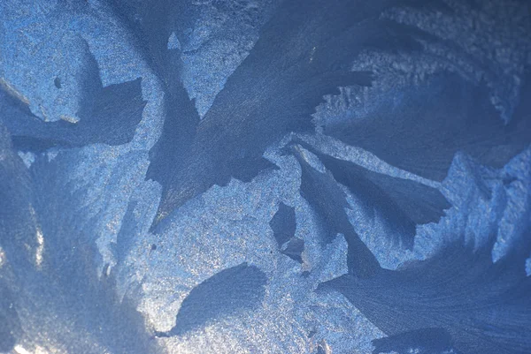 Ijs patroon op een venster in de winter — Stockfoto