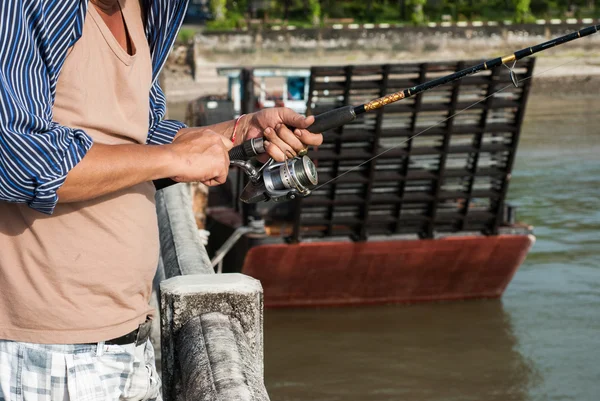 Young man fishing — Stock Photo, Image