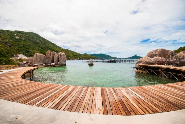 The wooden bridge at a beautiful beach — Stock Photo, Image