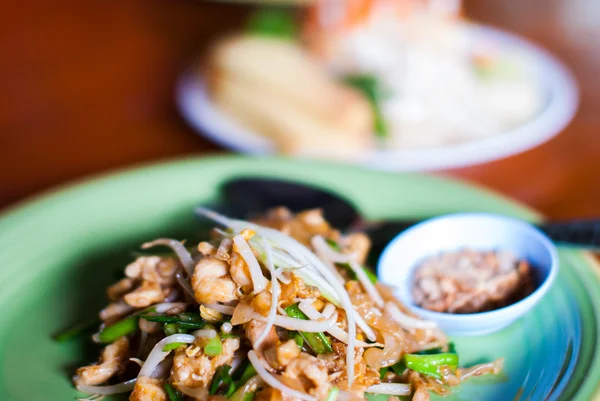 Pad thai with chicken and pork in dish — Stock Photo, Image