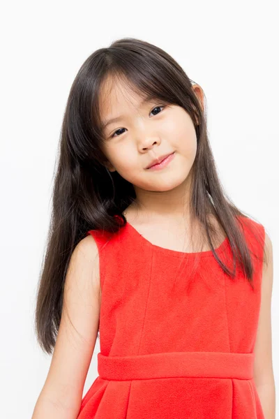 Malá Asijská dívka v krásných červených šatech — Stock fotografie