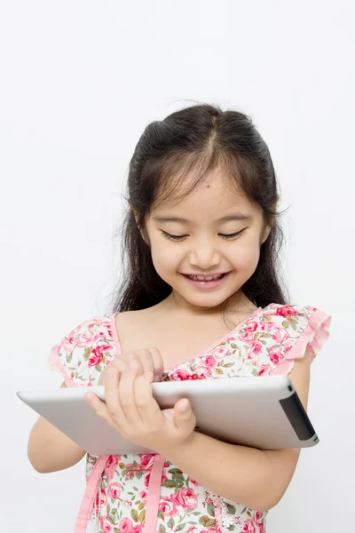 tablet bilgisayar ile oynarken mutlu Asyalı çocuk