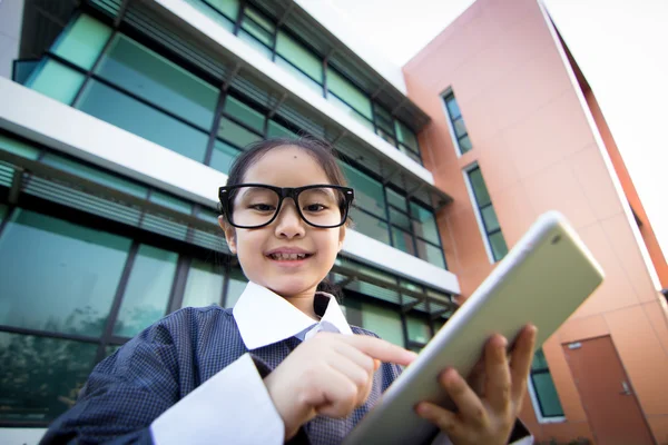 Business Asian child with tablet computer — Stock Photo, Image