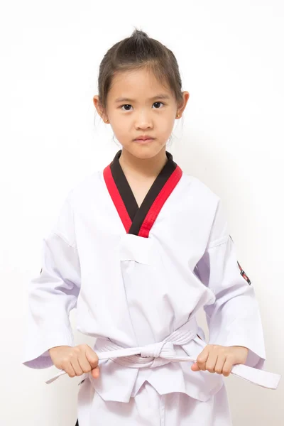 Little asian child in fighting action on isolated background — Stock Photo, Image