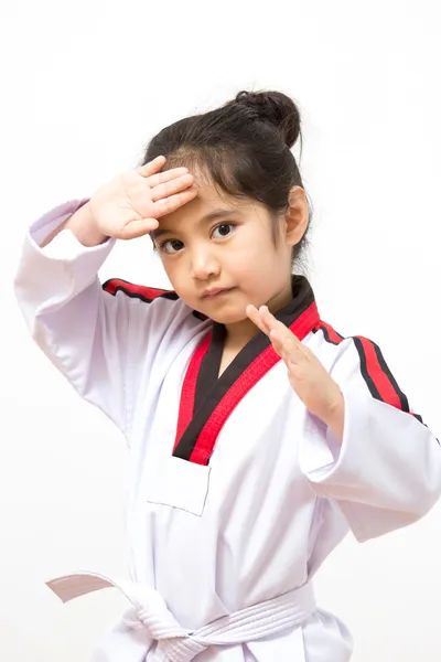 Little asian child in fighting action on isolated background — Stock Photo, Image