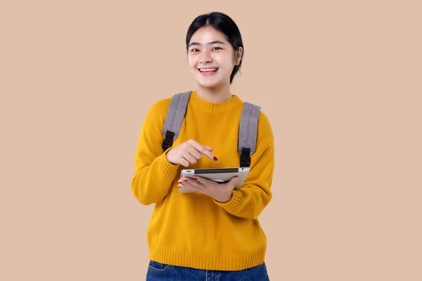 Young Asian Student Girl Using Tablet Computer Isolated Background — Stok Foto