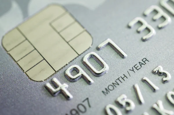 Lage belangrijke macro geschoten met oude creditcard. — Stockfoto