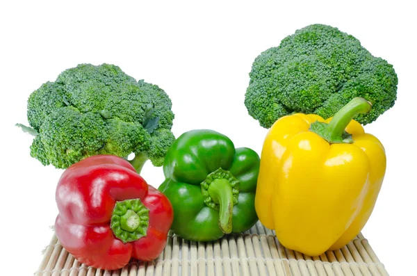 Colored paprika (pepper) and Broccoli on a white background — Stock Photo, Image