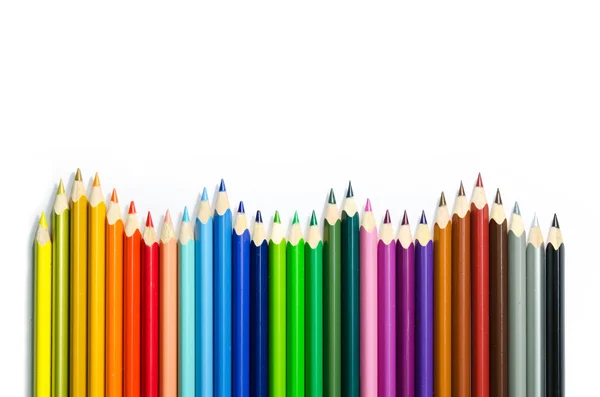 Barevné tužky izolované na bílém pozadí — Stock fotografie